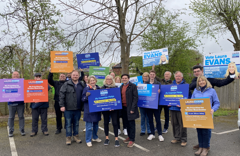 Laura Evans and Stockport Borough Conservatives with signs