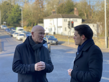 Paul and Nigel Noble discussing traffic in Marple Bridge