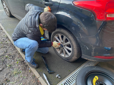 Paul Changing a Tyre - Pot Hole